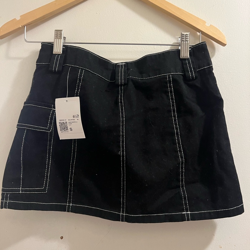 Black mini mini skirt with chain loop from Rue 21 never worn brand new!